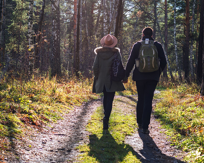 Couple walking in the woods, individual therapy serving Hastings on the Hudson, Irvington, Tarrytown, Dobbs Ferry, Pleasantville and all of New York State