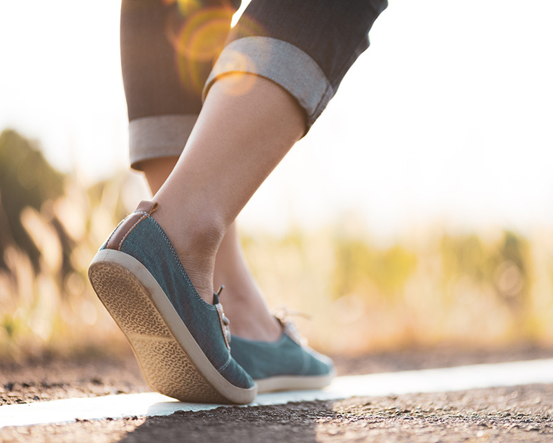 Person walking on a path for individual therapy in New York